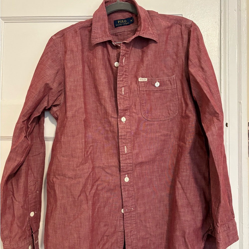 Polo size M rust colored button down. Front pocket.